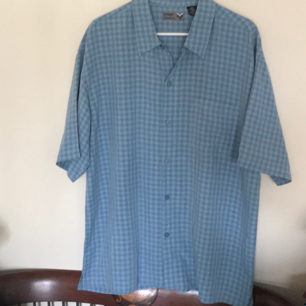 NWOT. Very nice men’s short sleeve shirt. Size XL